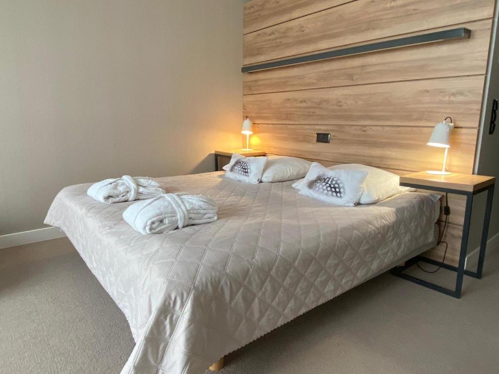 Postel nebo postele na pokoji v ubytování Hotel Bonifacio SPA&SPORT Resort