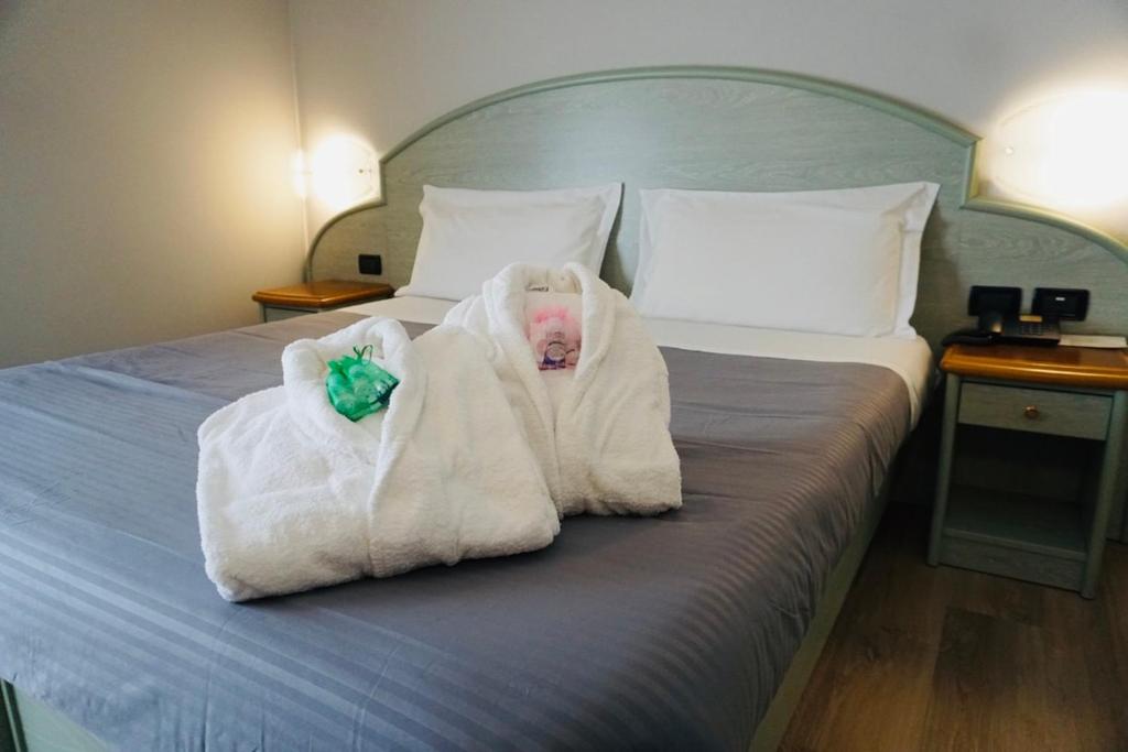 Postel nebo postele na pokoji v ubytování Hotel Europa Milano