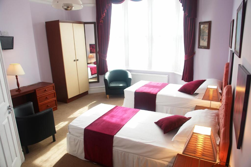 Postel nebo postele na pokoji v ubytování Filton Guest House