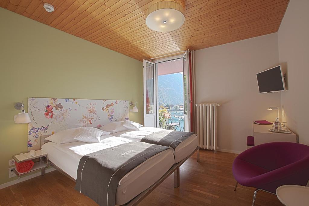 Postel nebo postele na pokoji v ubytování Boutique Hotel Bellevue
