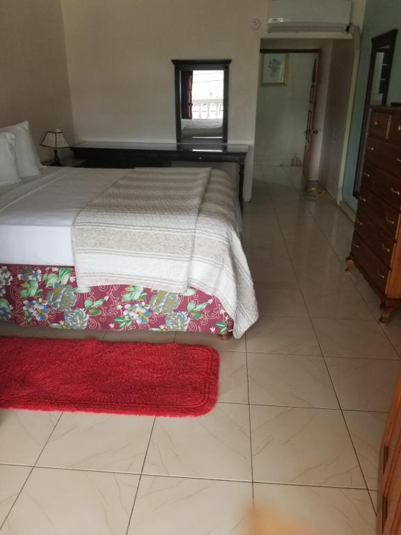 Postel nebo postele na pokoji v ubytování Chateau Margarita JA