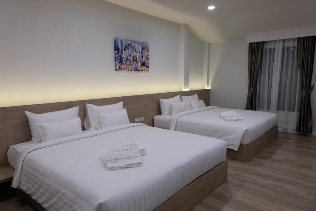 Postel nebo postele na pokoji v ubytování Li CALLA Resort Trat