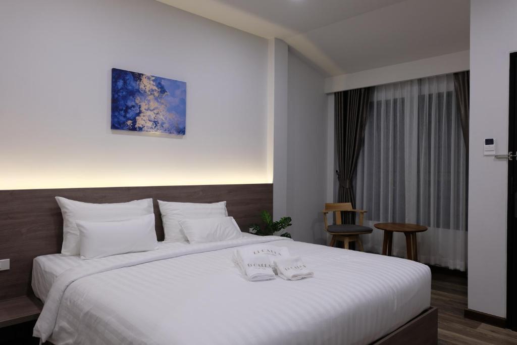 Postel nebo postele na pokoji v ubytování Li CALLA Resort Trat