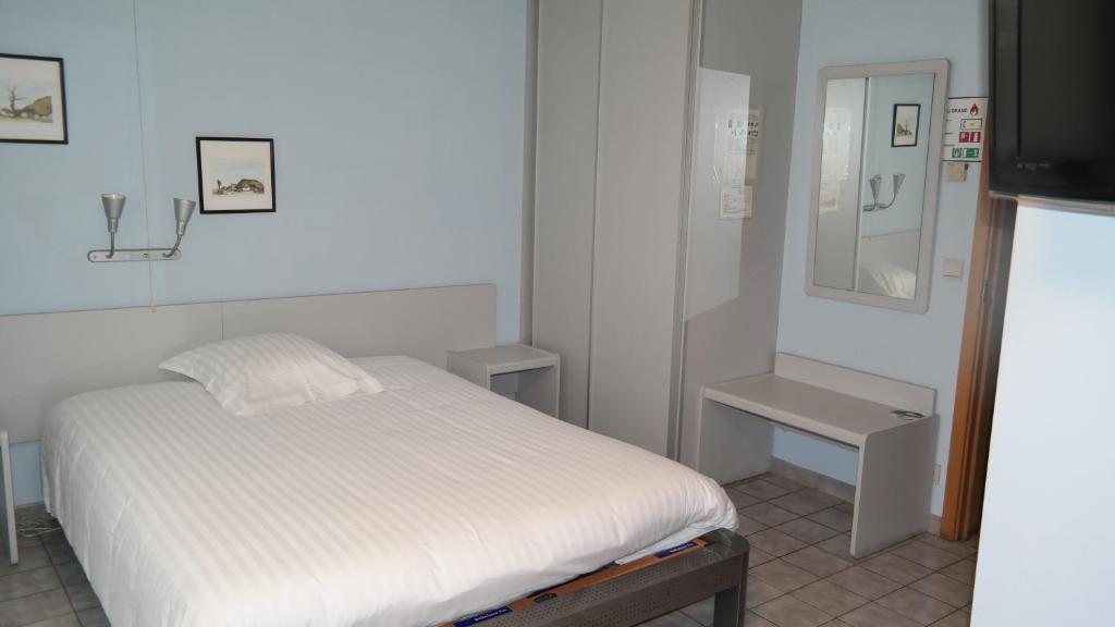 Postel nebo postele na pokoji v ubytování De Bonte Os Hotel & Tower