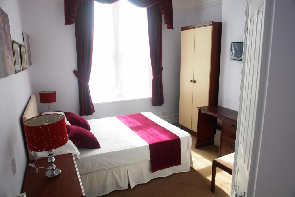 Postel nebo postele na pokoji v ubytování Filton Guest House