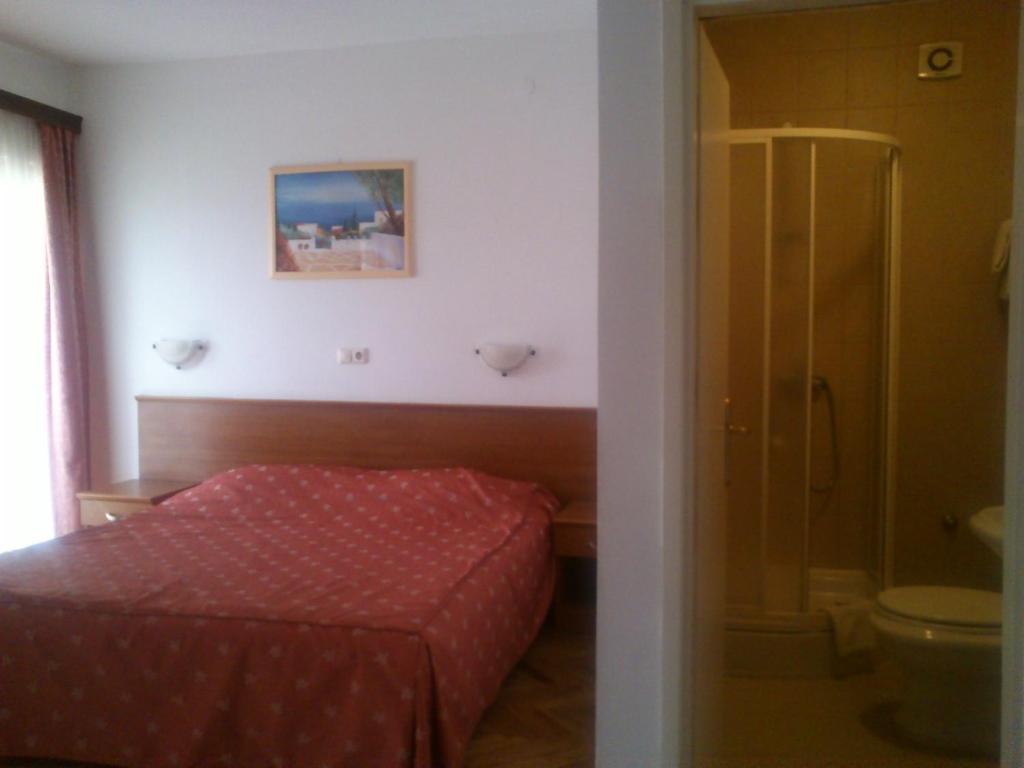 Posteľ alebo postele v izbe v ubytovaní Hotel Zuco