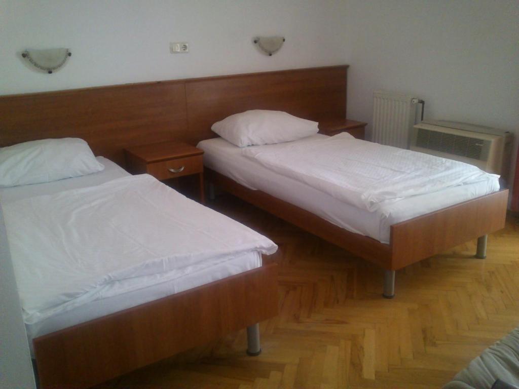 Posteľ alebo postele v izbe v ubytovaní Hotel Zuco
