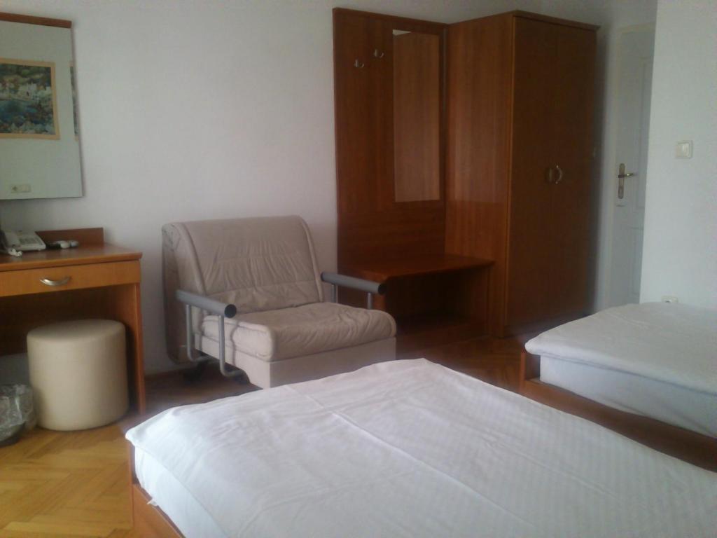 Posteľ alebo postele v izbe v ubytovaní Hotel Zuco