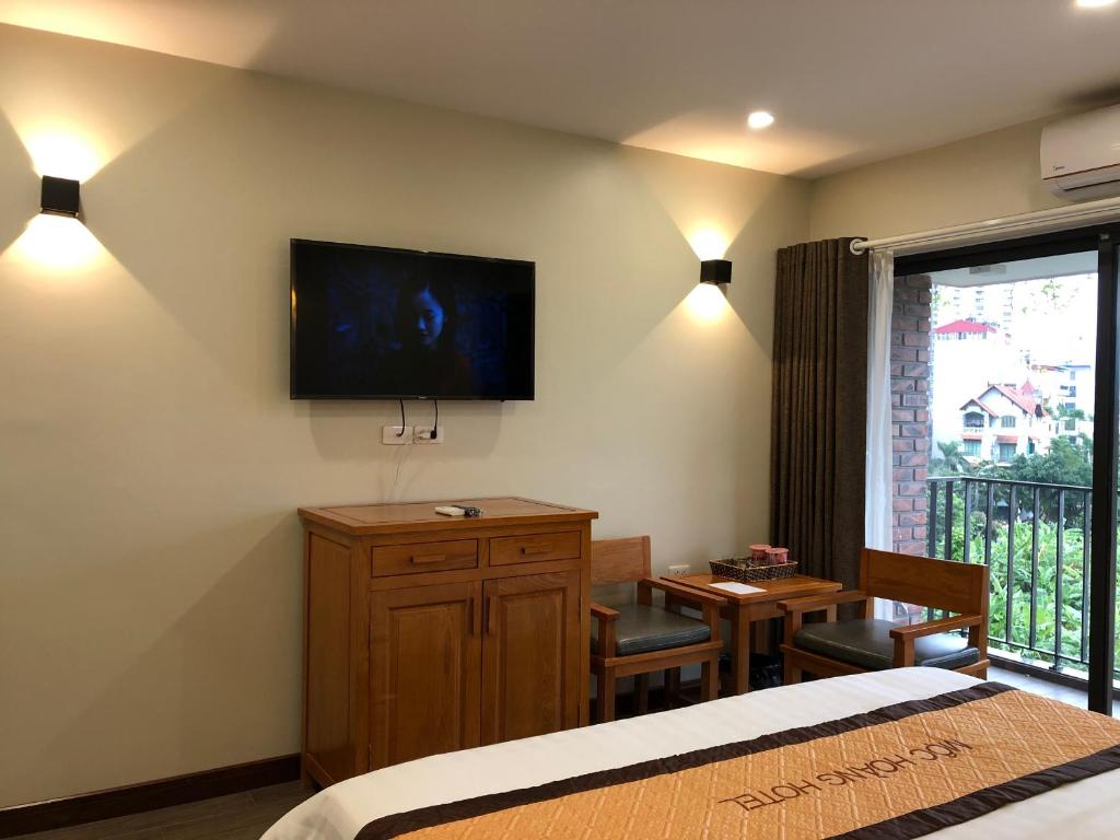 TV a/nebo společenská místnost v ubytování Moc Hoang Hotel