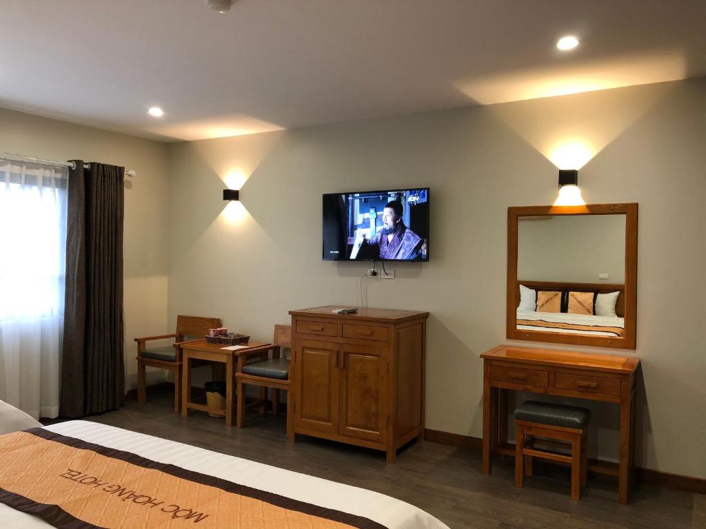 TV a/nebo společenská místnost v ubytování Moc Hoang Hotel