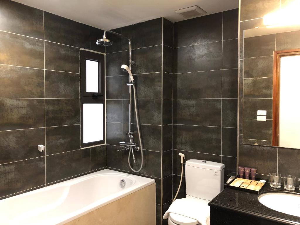 Koupelna v ubytování Moc Hoang Hotel