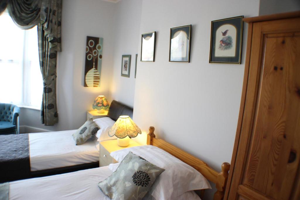 Postel nebo postele na pokoji v ubytování Filton Guest House