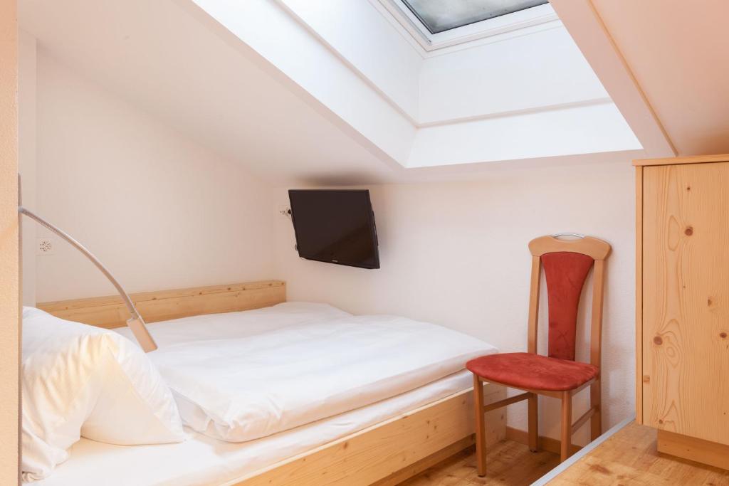 Postel nebo postele na pokoji v ubytování Hotel Capricorn