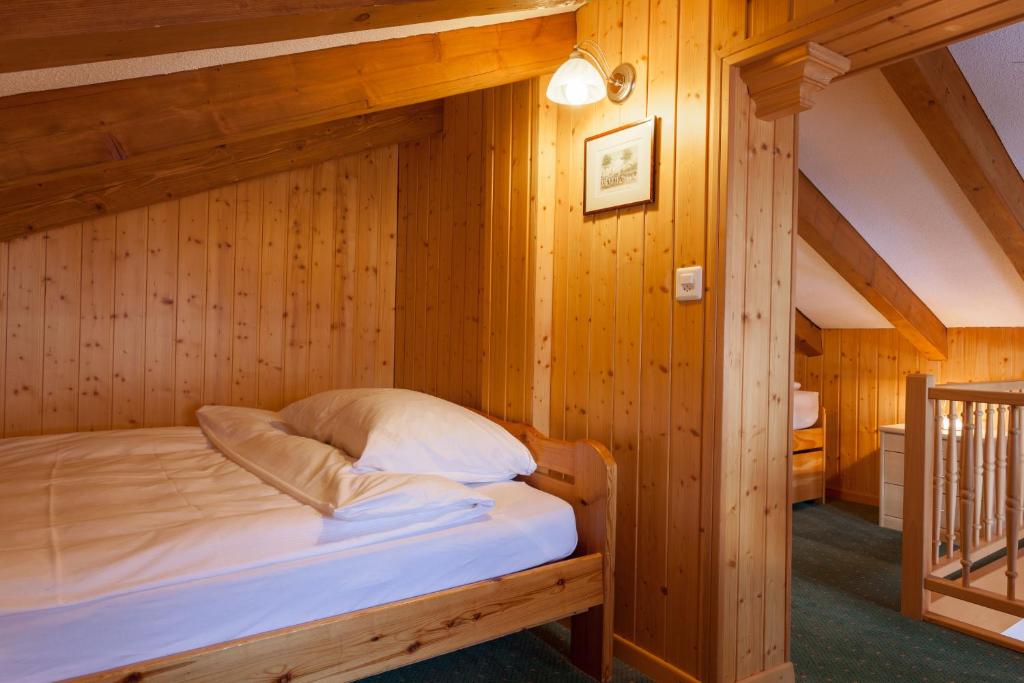 Postel nebo postele na pokoji v ubytování Hotel Capricorn