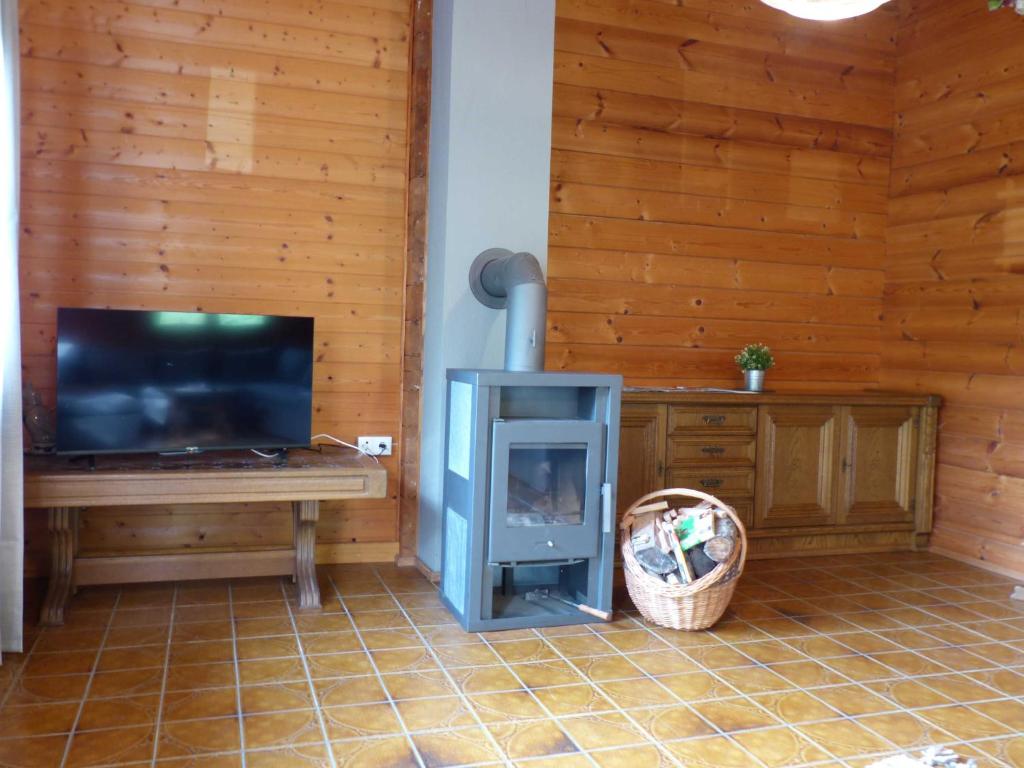 TV a/nebo společenská místnost v ubytování Ferienhaus Frankenglueck