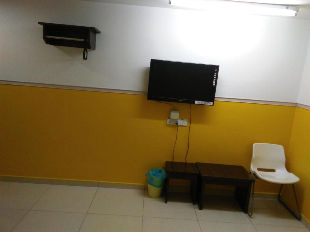 TV a/nebo společenská místnost v ubytování Hotel Abby IGB Tasek