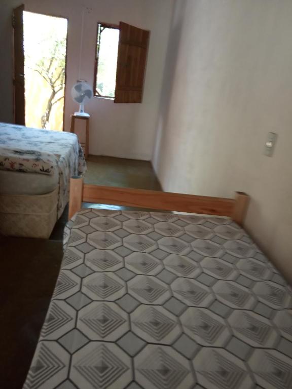 Postel nebo postele na pokoji v ubytování Casa Repousar