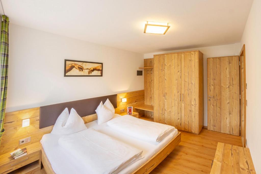 Posteľ alebo postele v izbe v ubytovaní Hotel Garni Angerer