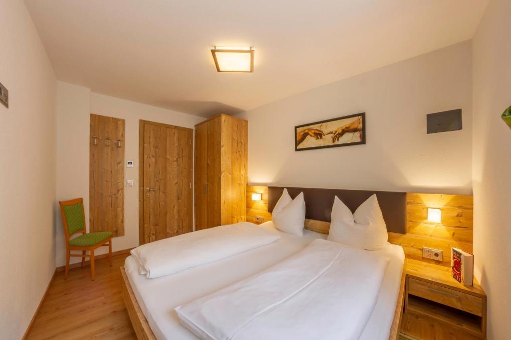 Posteľ alebo postele v izbe v ubytovaní Hotel Garni Angerer