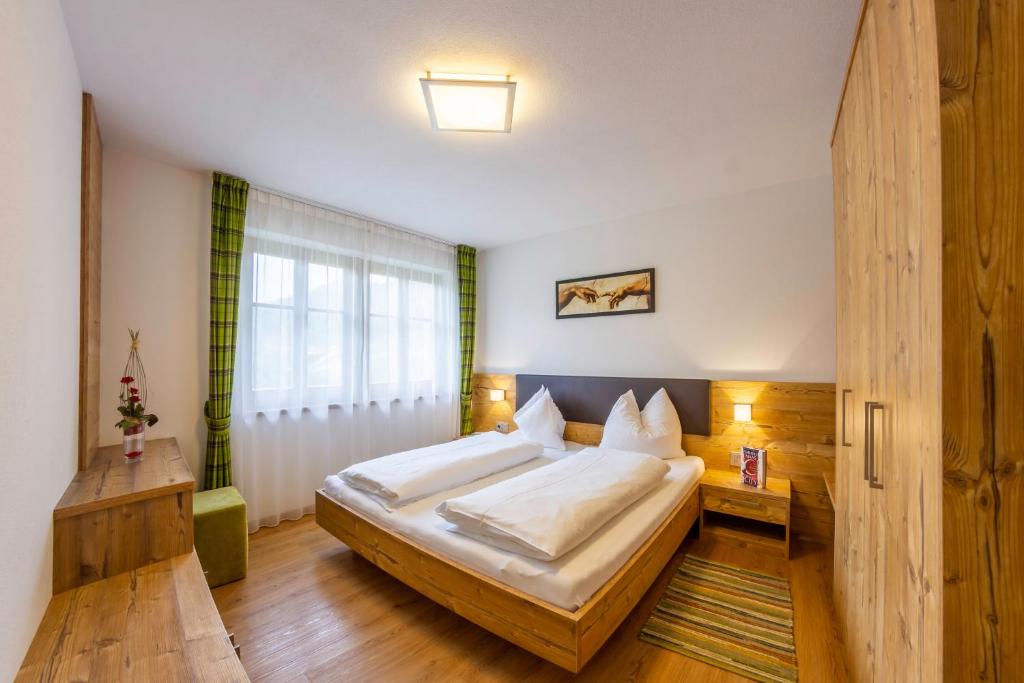 Posteľ alebo postele v izbe v ubytovaní Hotel Garni Angerer