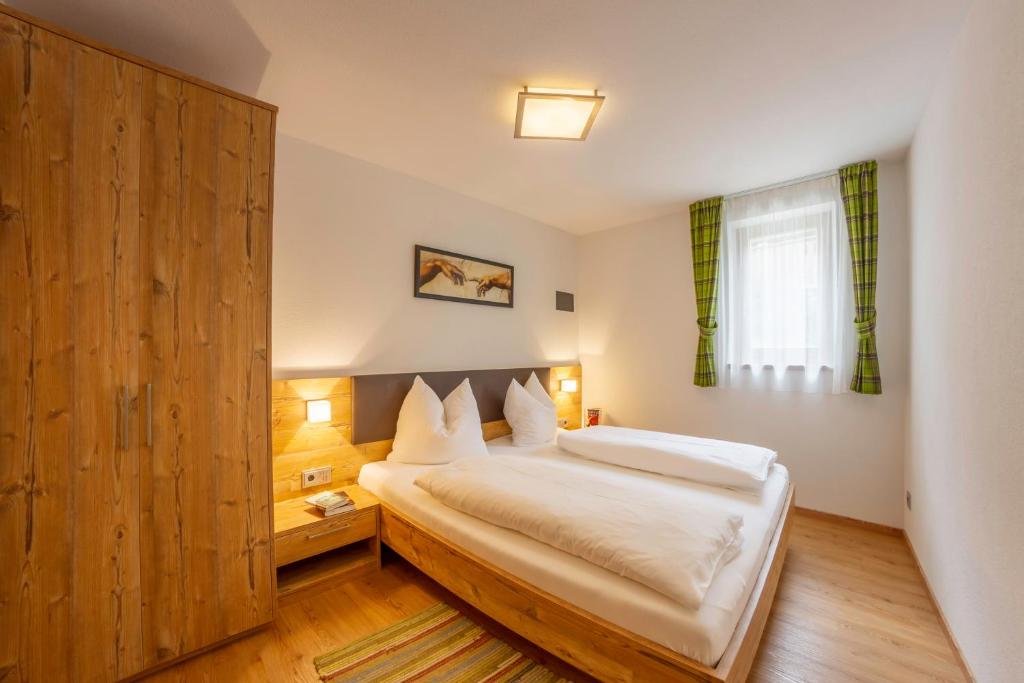 Posteľ alebo postele v izbe v ubytovaní Hotel Garni Angerer