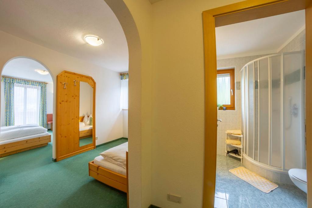 Posteľ alebo postele v izbe v ubytovaní Hotel Garni Angerer