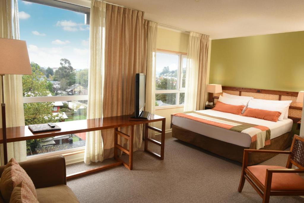 Postel nebo postele na pokoji v ubytování Solace Hotel Puerto Varas