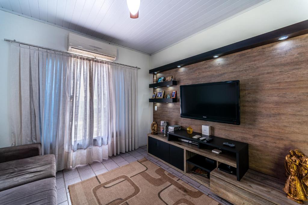  CASA 3 QUARTOS COM AR TV A CABO E WI-FI