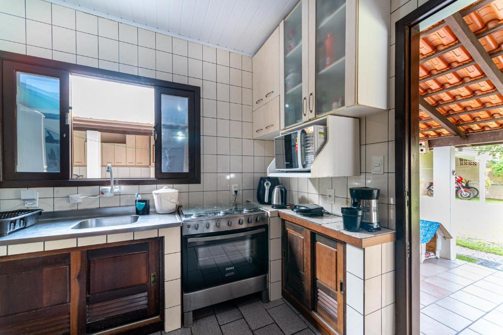  CASA 3 QUARTOS COM AR TV A CABO E WI-FI