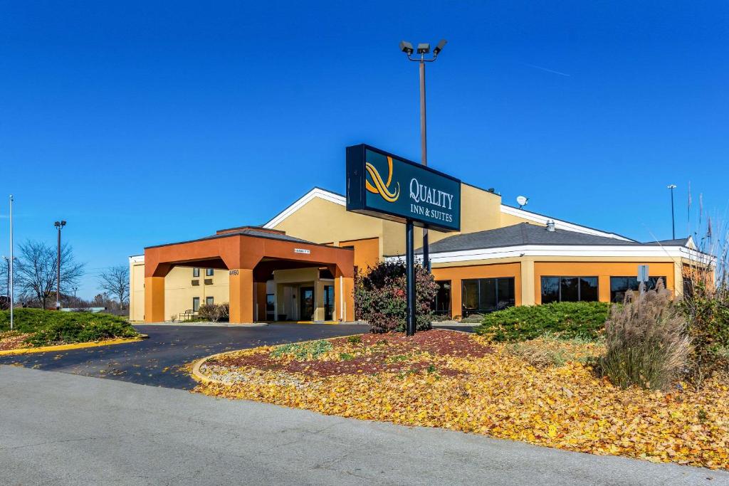 a building with a sign in front of it at Quality Inn & Suites Southport in Indianapolis