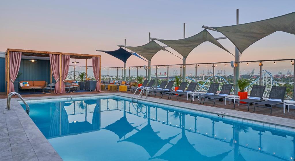 a swimming pool on the roof of a hotel at Hyatt Centric the Pike Long Beach in Long Beach