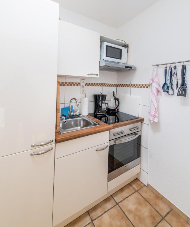 Kuchyň nebo kuchyňský kout v ubytování Ferienwohnung Kruppa