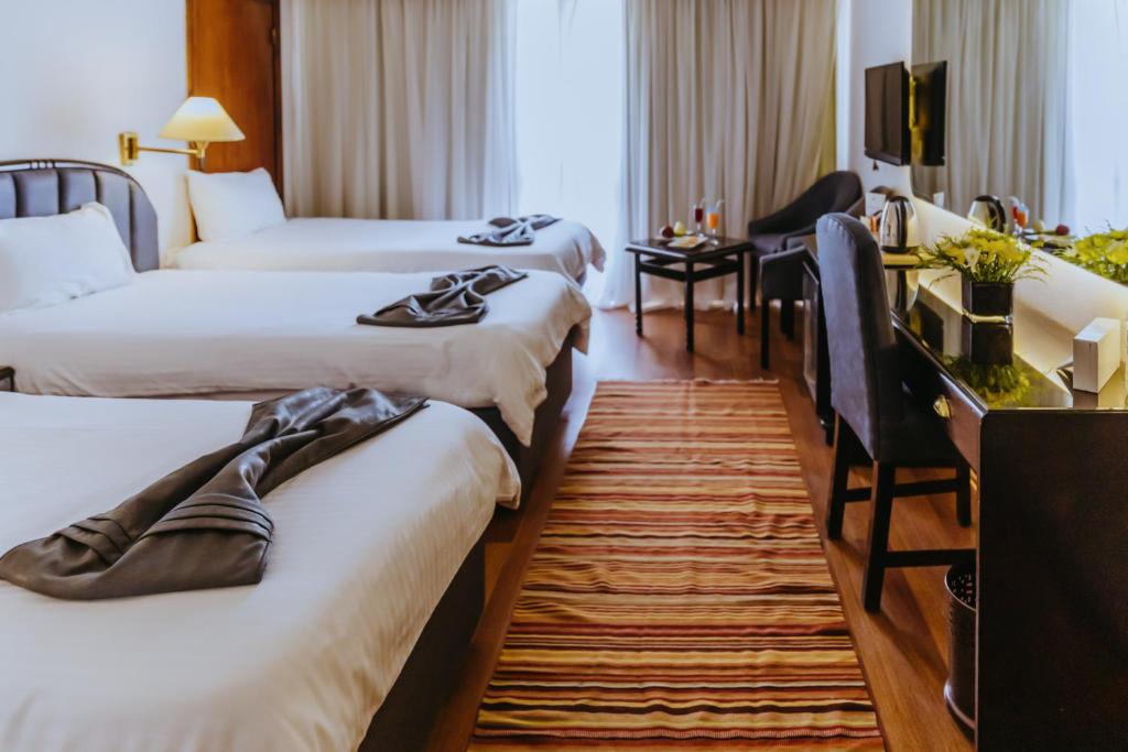 Llit o llits en una habitació de Basma Hotel Aswan