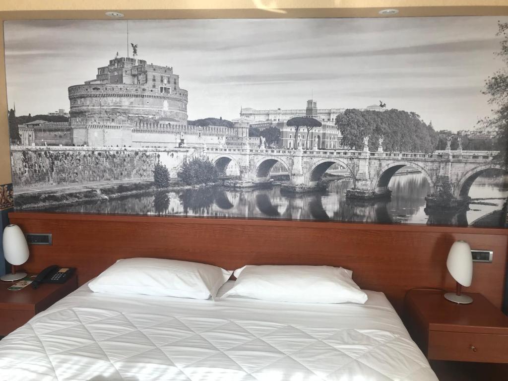 Postel nebo postele na pokoji v ubytování Ele Green Park Hotel Pamphili