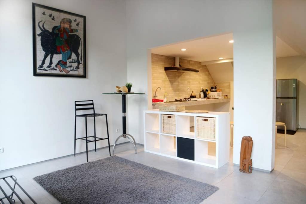 Кухня или мини-кухня в Minima Residence
