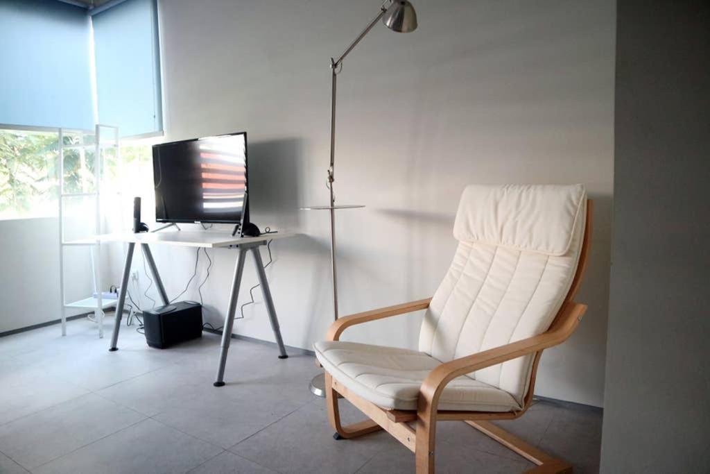 TV a/nebo společenská místnost v ubytování Minima Residence