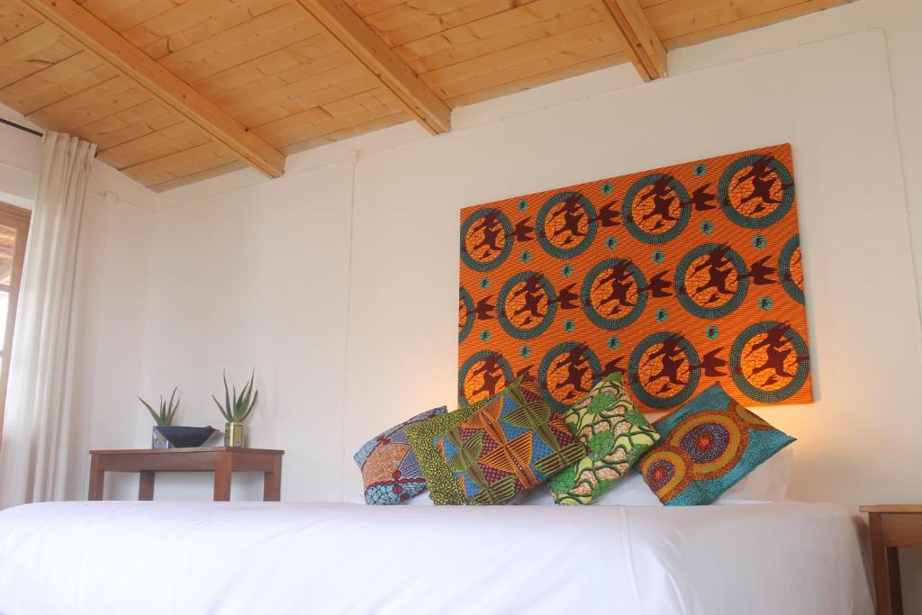 Postel nebo postele na pokoji v ubytování La Fora Ecolodge
