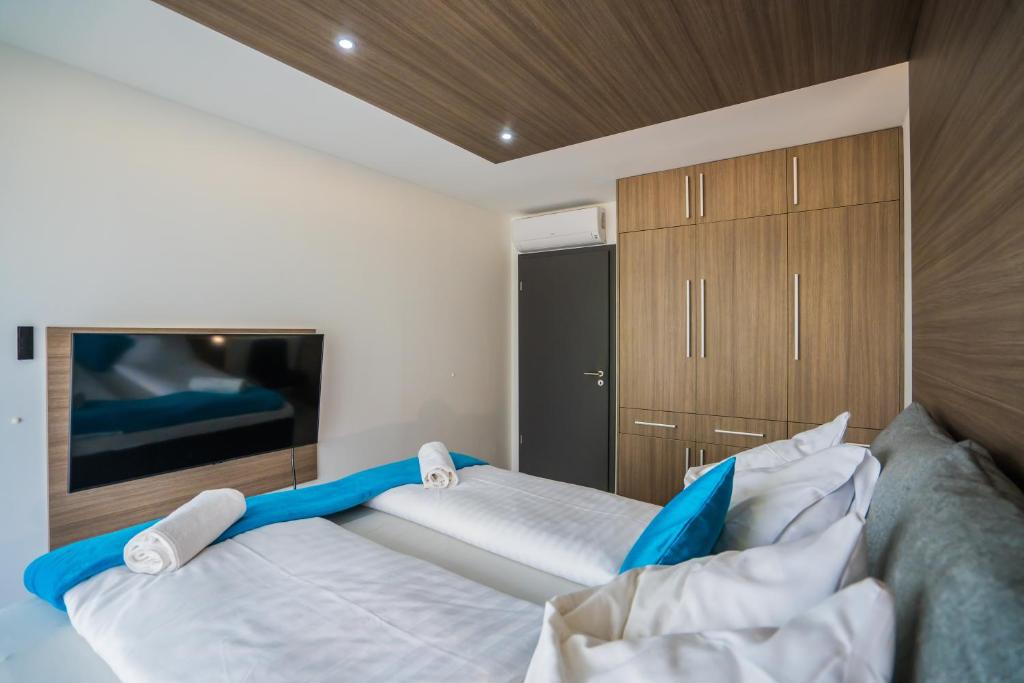 Posteľ alebo postele v izbe v ubytovaní MyFlat B-Lake Silver Apartment