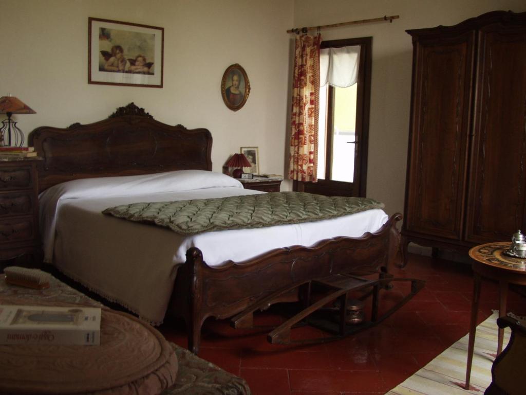 Postel nebo postele na pokoji v ubytování B&B Casa Manuelli
