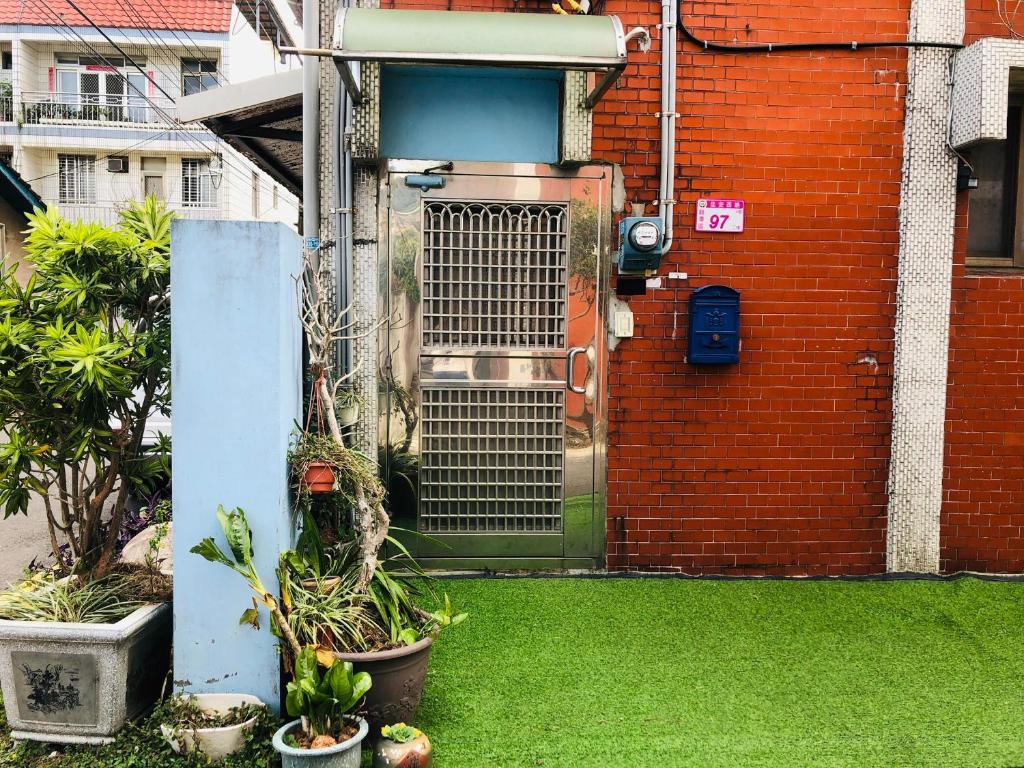 Um jardim no exterior de 緣心 民宿