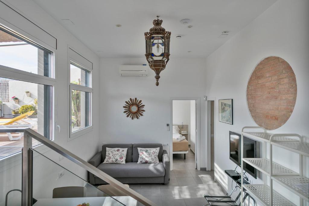 A seating area at Stay Together Barcelona Apartments