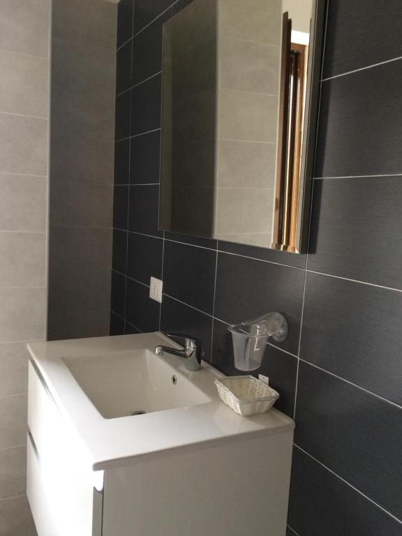 Koupelna v ubytování Caruso Rooms