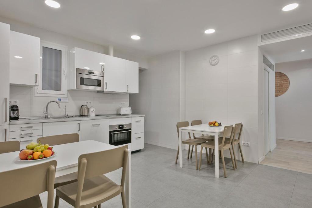 A kitchen or kitchenette at Stay Together Barcelona Apartments