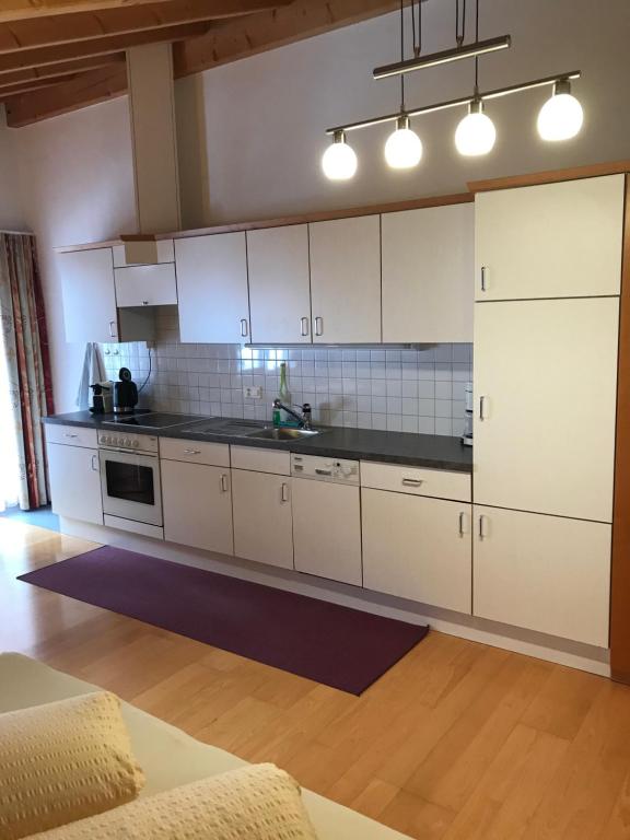 Kuchyň nebo kuchyňský kout v ubytování Apart Bellezza