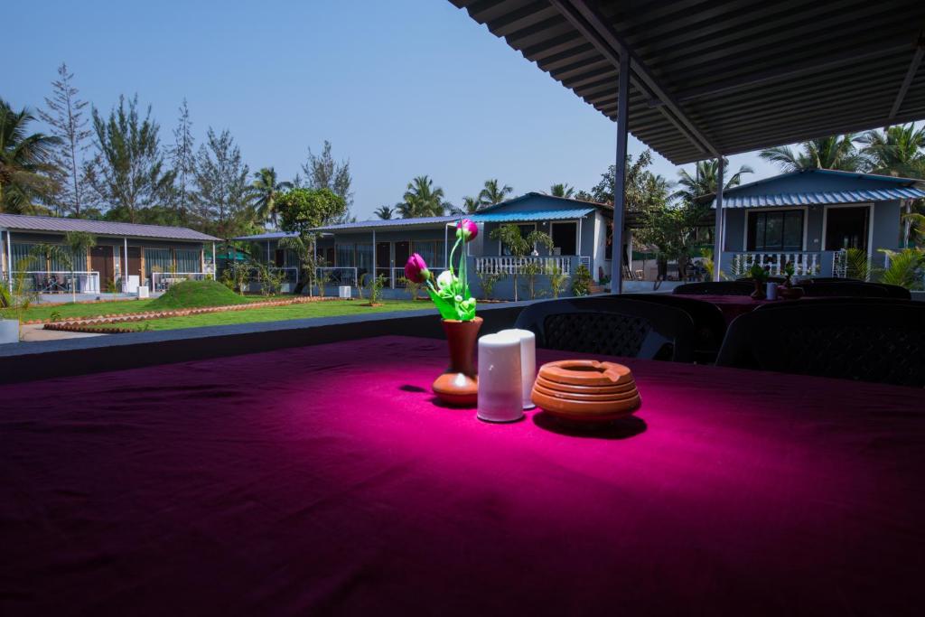 Zahrada ubytování Treebo Lands End Beach Resort Morjim