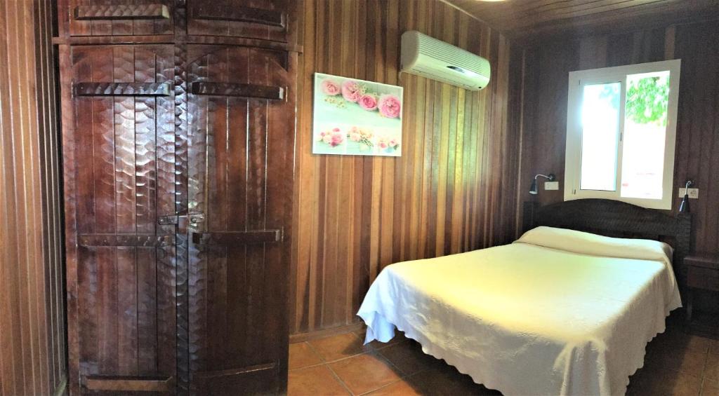 Postel nebo postele na pokoji v ubytování Casa Inmaculada Cabañas Mini Complejo Entero