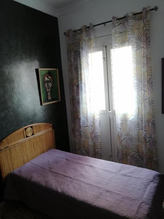 Postel nebo postele na pokoji v ubytování Alcaravaneras Hostel