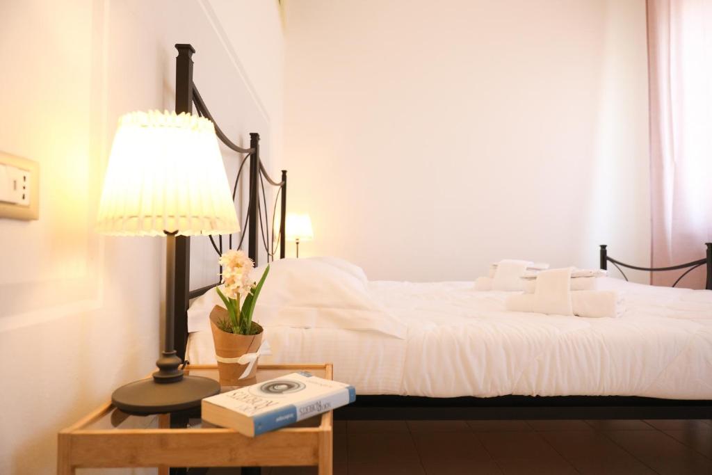 Posteľ alebo postele v izbe v ubytovaní Welc-ōm Santa Giustina apartment