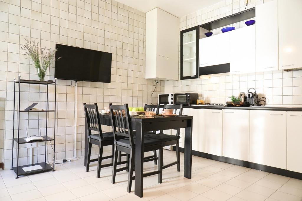 Kuchyňa alebo kuchynka v ubytovaní Welc-ōm Santa Giustina apartment