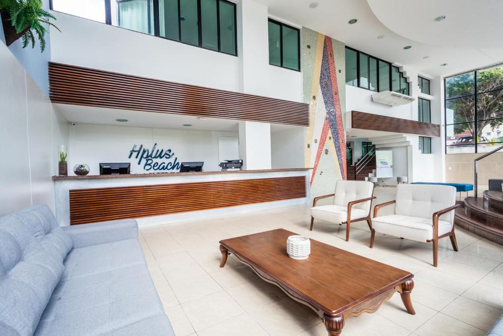 Uma área de estar em João Pessoa Hplus Beach